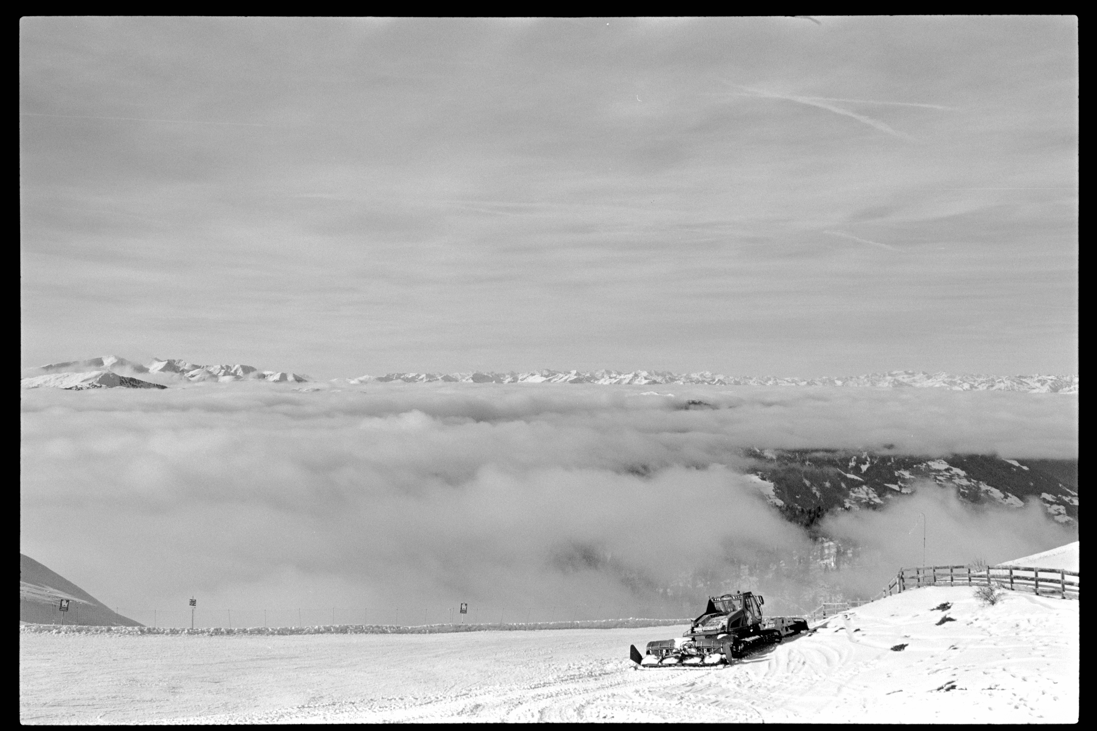 Snowcat on a mountain slope